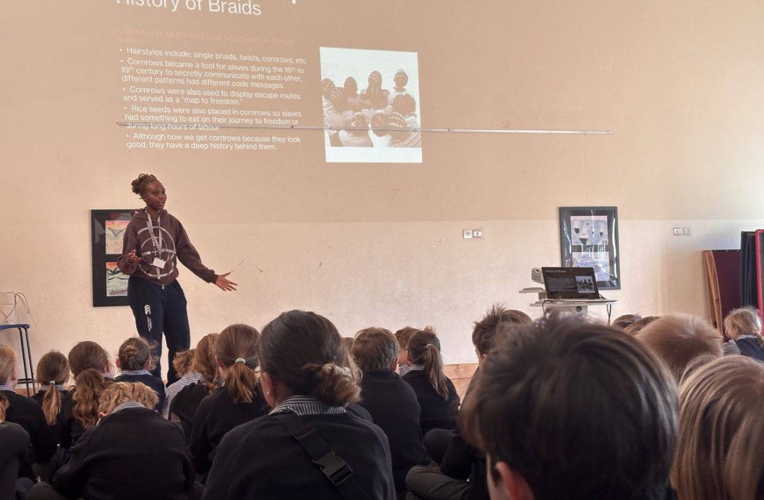 International boarding student at Sidcot presenting an assembly to the Junior School