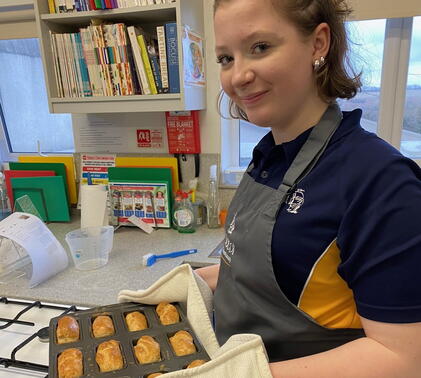 Student baking during Food Circle