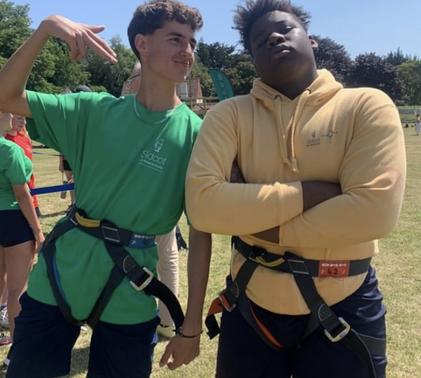 Two Sidcot students on Sports Day in climbing gear