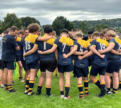 Sidcot Rugby Team In A Huddle
