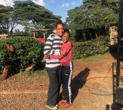 Ruby hugging one of her students in Kenya