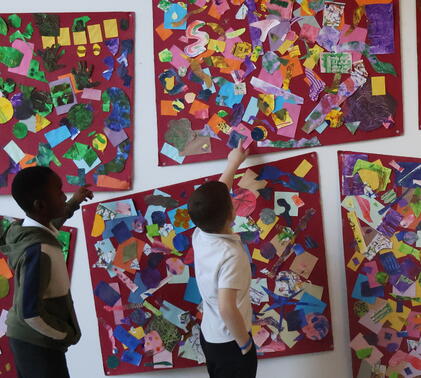 ELAN pupils looking at their artwork at Sidcot Art Centre