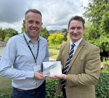 James Oakley and James Jones accept Pearson Teaching Award