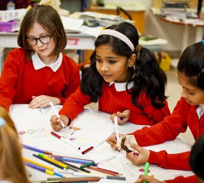 3 school girls drawing