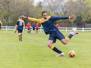 Boy playing football