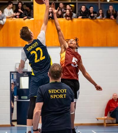 Sidcot students playing basketball 