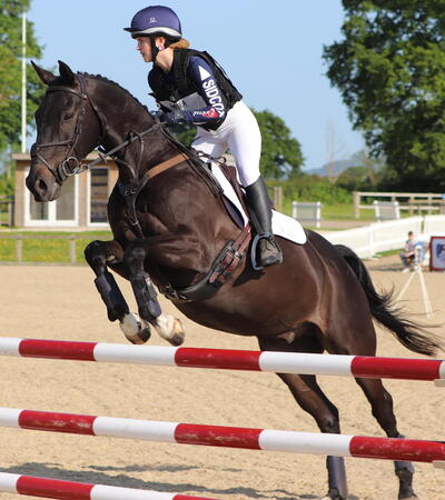 Sidcot student jumping on a horse