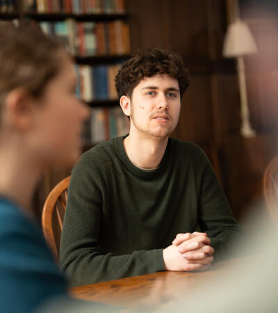 Sidcot student sitting in library