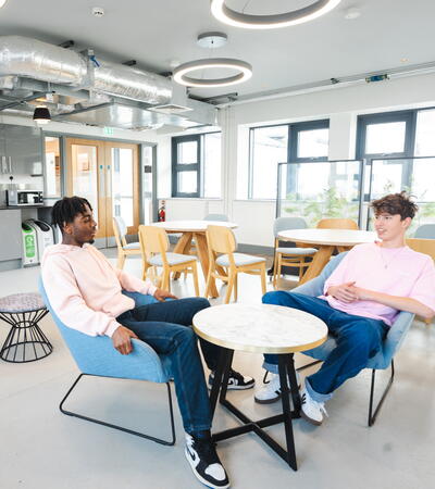 two boys sitting in the Sidcot Sixth Form Centre