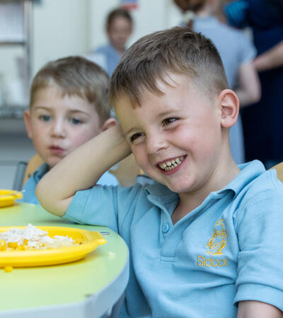 Sidcot Pre-School student eating lunch
