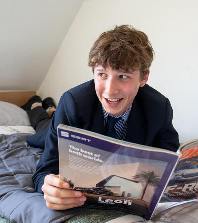 boy on bed reading