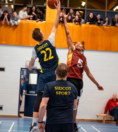 Sidcot student playing basketball