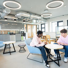 Two students in the Sixth Form Centre common room