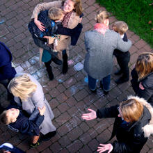 Junior School pupils hugging their parents
