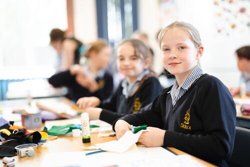 two girls enjoying a lesson at a private primary school