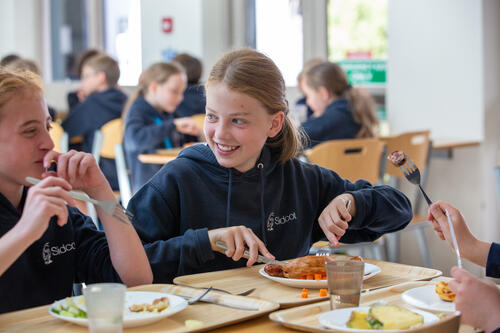 School Girl Eating Lunch