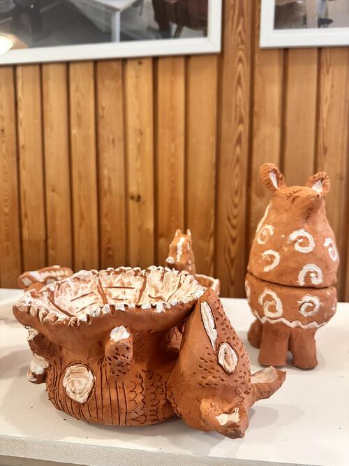 Clay animal figures on display