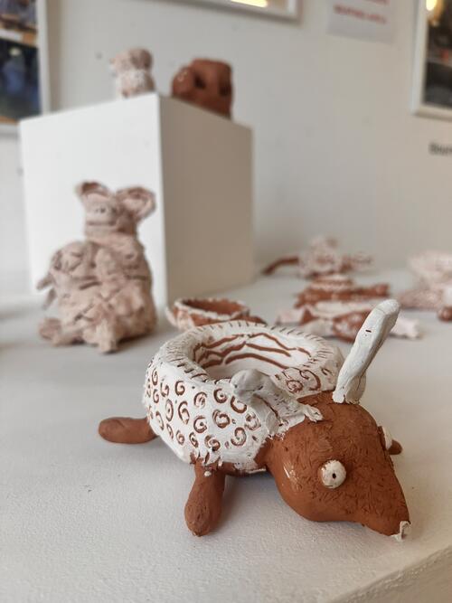 Clay animal figures on display