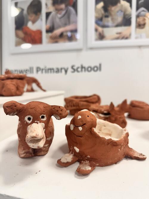Clay animal figures on display